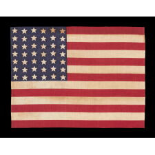 42 STARS ON AN ANTIQUE AMERICAN FLAG WITH A WAVE CONFIGURATION OF LINEAL COLUMNS, AN UNOFFICIAL STAR COUNT THAT REFLECTS THE ADDITION OF WASHINGTON STATE, MONTANA, AND THE DAKOTAS, circa 1889-1890