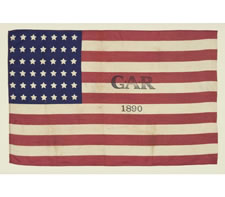 42 STARS, AN UNOFFICIAL STAR COUNT, WITH A CIVIL WAR VETERANS' OVERPRINT ACCOMPANIED BY THE DATE "1890",  UNUSUALLY EARLY FOR A G.A.R. FLAG & THE ONLY KNOWN EXAMPLE IN THIS STYLE