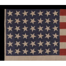 42 STARS, AN UNOFFICIAL STAR COUNT, ON AN ANTIQUE AMERICAN FLAG WITH SCATTERED STAR POSITIONING, 1889-1890, WASHINGTON STATEHOOD