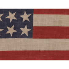 42 STARS, AN UNOFFICIAL STAR COUNT, ON AN ANTIQUE AMERICAN FLAG WITH SCATTERED STAR POSITIONING, 1889-1890, WASHINGTON STATEHOOD