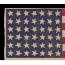 42 STARS, AN UNOFFICIAL STAR COUNT, ON AN ANTIQUE AMERICAN FLAG WITH SCATTERED STAR POSITIONING, 1889-1890, WASHINGTON STATEHOOD