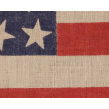 42 STARS, AN UNOFFICIAL STAR COUNT, ON AN ANTIQUE AMERICAN FLAG WITH SCATTERED STAR POSITIONING, 1889-1890, WASHINGTON STATEHOOD