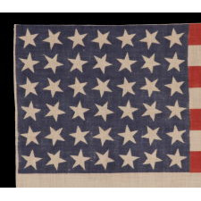 42 STARS, AN UNOFFICIAL STAR COUNT, ON AN ANTIQUE AMERICAN FLAG WITH SCATTERED STAR POSITIONING, 1889-1890, WASHINGTON STATEHOOD