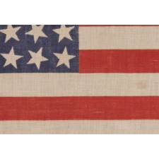 42 STARS, AN UNOFFICIAL STAR COUNT, ON AN ANTIQUE AMERICAN FLAG WITH SCATTERED STAR POSITIONING, 1889-1890, WASHINGTON STATEHOOD