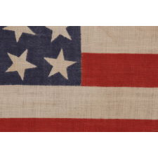 42 STARS, AN UNOFFICIAL STAR COUNT, ON AN ANTIQUE AMERICAN FLAG WITH SCATTERED STAR POSITIONING, 1889-1890, WASHINGTON STATEHOOD