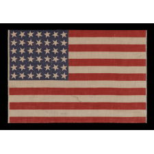 42 STARS, AN UNOFFICIAL STAR COUNT, ON AN ANTIQUE AMERICAN FLAG WITH SCATTERED STAR POSITIONING, 1889-1890, WASHINGTON STATEHOOD