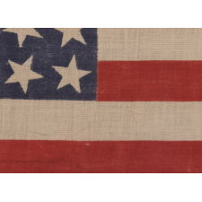 42 STARS, AN UNOFFICIAL STAR COUNT, ON AN ANTIQUE AMERICAN FLAG WITH SCATTERED STAR POSITIONING, 1889-1890, WASHINGTON STATEHOOD