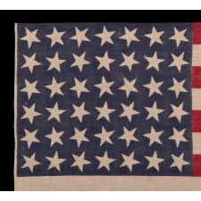 42 STARS, AN UNOFFICIAL STAR COUNT, ON AN ANTIQUE AMERICAN FLAG WITH SCATTERED STAR POSITIONING, 1889-1890, WASHINGTON STATEHOOD