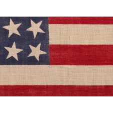 42 STARS, AN UNOFFICIAL STAR COUNT, ON AN ANTIQUE AMERICAN FLAG WITH SCATTERED STAR POSITIONING, 1889-1890, WASHINGTON STATEHOOD