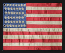 44 STAR FLAG UPDATED TO 45 STARS, A TERRIFIC FOLK EXAMPLE WITH STRONG COLORS, HIGHLY UNUSUAL, MADE OF SATIN AND ENTIRELY HAND-SEWN, TRANSITION FROM WYOMING TO UTAH STATEHOOD, 1890-1896