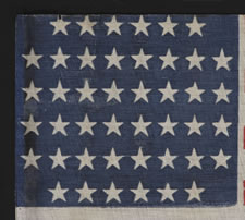 44 STARS, 1890-1896, WYOMING STATEHOOD, A VERY SCARCE VARIETY WITH A RECTILINEAL STAR PATTERN THAT IS NOTCHED IN ALL FOUR CORNERS