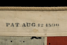 44 STARS CONFIGURED INTO THE LETTERS "U.S.", PATENTED IN 1890 BY W.R. WASHBURN, ONE OF ONLY FOUR KNOWN SURVIVING EXAMPLES AND ONE OF THE BOLDEST DESIGNS KNOWN TO EXIST IN EARLY FLAGS