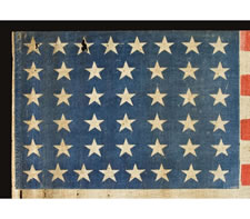 44 STARS IN JUSTIFIED ROWS, A LARGE PARADE FLAG WITH AN ELONGATED FORMAT, STRONG COLOR, AND GREAT WEAR, WYOMING STATEHOOD, 1890-1896