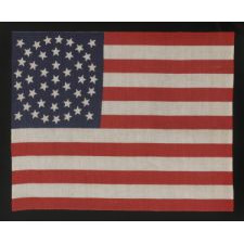 44 STARS ON A LARGE SCALE PARADE FLAG, WYOMING STATEHOOD, 1890-1896, RARE IN THIS PERIOD WITH A WREATH CONFIGURATION