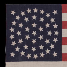 44 STARS ON A LARGE SCALE PARADE FLAG, WYOMING STATEHOOD, 1890-1896, RARE IN THIS PERIOD WITH A WREATH CONFIGURATION