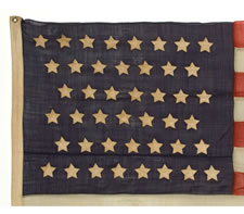 44 STARS WITH SHORT, CONICAL ARMS, ARRANGED IN OFFSET ZIGZAG ROWS, SIGNED "J.S. OBERHOLTZER, GERMANTOWN, PENNSYLVANIA", WYOMING STATEHOOD, 1890-1896