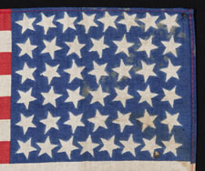 44 STARS, WYOMING STATEHOOD, WITH SCATTERED STAR POSITIONING AND AN OVERPRINT FROM A CELEBRATION OF INDEPENDENCE DAY IN THE TOWN OF COLFAX, INDIANA, IN 1893