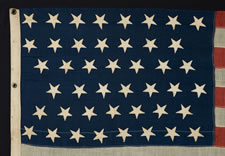 44 UPSIDE-DOWN STARS IN ZIGZAG ROWS, UNUSUALLY SMALL SIZE, WYOMING STATEHOOD, 1890-1896