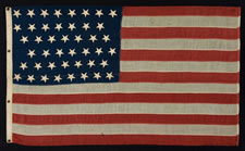 44 UPSIDE-DOWN STARS IN ZIGZAG ROWS, UNUSUALLY SMALL SIZE, WYOMING STATEHOOD, 1890-1896