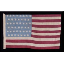 45 HAND-EMBROIDERED STARS WITH WONDERFUL, FLOWER-LIKE PROFILES ON A HOMEMADE SILK FLAG WITH A CORNFLOWER BLUE CANTON AND BURGUNDY RED STRIPES, A MAGIFICENT EXAMPLE OF THE 1896-1908 PERIOD, SPANISH-AMERICAN WAR ERA, UTAH STATEHOOD