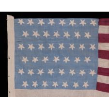 45 HAND-EMBROIDERED STARS WITH WONDERFUL, FLOWER-LIKE PROFILES ON A HOMEMADE SILK FLAG WITH A CORNFLOWER BLUE CANTON AND BURGUNDY RED STRIPES, A MAGIFICENT EXAMPLE OF THE 1896-1908 PERIOD, SPANISH-AMERICAN WAR ERA, UTAH STATEHOOD