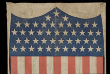 45 STAR PATRIOTIC FLAG SHIELD BUNTING, AN UNUSUAL TEXTILE WITH VERY ATTRACTIVE VERTICAL FORMAT, SPANISH-AMERICAN WAR ERA, 1896-1907