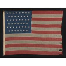 45 STARS ON AN ANTIQUE AMERICAN FLAG WITH A RICH INDIGO BLUE CANTON AND ATTRACTIVE WEAR, 1896-1907, SPANISH-AMERICAN WAR ERA, UTAH STATEHOOD