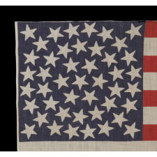 45 STARS ON AN ANTIQUE AMERICAN PARADE FLAG WITH A MEDALLION CONFIGURATION, A RARE FEATURE IN THIS PERIOD, 1896-1908, UTAH STATEHOOD, EX-RICHARD PIERCE COLLECTION