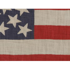 45 STARS ON AN ANTIQUE AMERICAN PARADE FLAG WITH A MEDALLION CONFIGURATION, A RARE FEATURE IN THIS PERIOD, 1896-1908, UTAH STATEHOOD, EX-RICHARD PIERCE COLLECTION