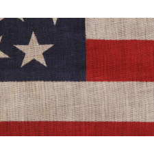 45 STARS IN LINEAR ROWS, WITH “DANCING” OR “TUMBLING” ORIENTATION, ON AN ANTIQUE AMERICAN PARADE FLAG, 1896-1908, SPANISH-AMERICAN WAR ERA, REFLECTS UTAH STATEHOOD