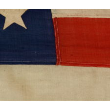 46 STARS ON AN ANTIQUE AMERICAN FLAG, SIGNED BY THE MAKER, M.G. COPELAND OF WASHINGTON, D.C., 1907-1912, OKLAHOMA STATEHOOD