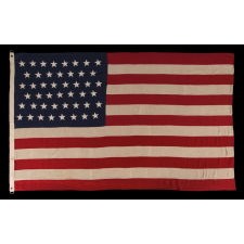 46 STARS ON AN ANTIQUE AMERICAN FLAG OF ESPECIALLY HIGH QUALITY, WITH ORIGINAL REINFORCEMENTS AND HEAVY D-RINGS ON THE HOIST BINDING, 1907-1912, OKLAHOMA STATEHOOD