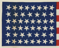 46 STARS ON A BRILLIANT, ROYAL BLUE CANTON, 1907-1912, OKLAHOMA STATEHOOD, SCATTERED STAR POSITIONING