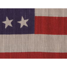 46 STARS IN CANTED ROWS ON AN ANTIQUE AMERICAN PARADE FLAG MADE OF SILK, 1907-1912, OKLAHOMA STATEHOOD