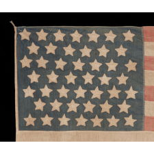 46 STARS ON A COTTON FLAG WITH AN UNUSUAL LINEAL PATTERN OF STARS IN 7 ROWS, PROBABLY OF HOMEMADE ORIGIN, WITH BEAUTIFUL WEAR AND PRESENTATION, OKLAHOMA STATEHOOD, 1907-1912