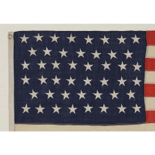 46 STARS ON A FLAG IN A SMALL SCALE FOR THE PERIOD, 1907-1912, OKLAHOMA STATEHOOD