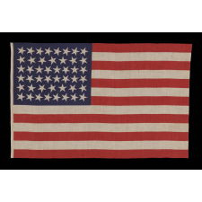 46 STARS WITH VARIED STAR POSITIONING ON AN ANTIQUE AMERICAN FLAG, 1907-1912, REFLECTS OKLAHOMA STATEHOOD