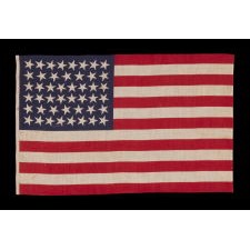 46 STARS WITH VARIED STAR POSITIONING ON AN ANTIQUE AMERICAN FLAG, 1907-1912, REFLECTS OKLAHOMA STATEHOOD