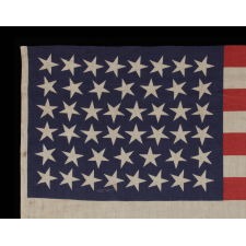 46 STARS WITH VARIED STAR POSITIONING ON AN ANTIQUE AMERICAN FLAG, 1907-1912, REFLECTS OKLAHOMA STATEHOOD