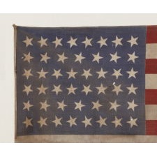 46 STARS WITH VARIED STAR POSITIONING ON AN ANTIQUE AMERICAN FLAG, 1907-1912, REFLECTS OKLAHOMA STATEHOOD