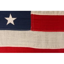 47 STAR ANTIQUE AMERICAN FLAG WITH ZIGZAGGING ROWS, AN EXTREMELY SCARCE EXAMPLE, IN AN UNUSUALLY MANAGEABLE SIZE AMONG ITS KNOWN COUTERPARTS; AN UNOFFICIAL STAR COUNT, 1912, NEW MEXICO STATEHOOD