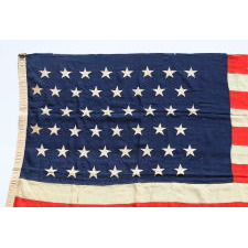 47 STARS ON AN ANTIQUE AMERICAN FLAG MADE TO REFLECT NEW MEXICO STATEHOOD, AN EXTREMELY SCARCE EXAMPLE, NEVER AN UNOFFICIAL STAR COUNT, CA 1912