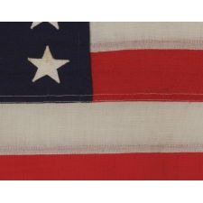 48 STAR FLAG & MATCHING COMMISSIONING PENNANT OF THE WWII ERA, SELDOM EVER FOUND IN A MATCHING PAIR, BROUGHT HOME BY U.S. NAVY AMPHIBIOUS FORCES GROUP SAILOR LUTHER VOIGHT LINGLE, WHO SERVED ON THE U.S.S. REEVES, THE FIRST AMERICAN SHIP TO DROP ANCHOR IN JAPANESE WATERS BEFORE THE SURRENDER