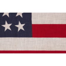 48 STAR STAR FLAG WITH STARS CANTED TO THE RIGHT AND LEFT IN DANCING ROWS, A RARE VARIETY OF ANTIQUE AMERICAN PARADE FLAG IN A LARGE SCALE, 1912-1918 OR PERHAPS EARLIER, ARIZONA & NEW MEXICO STATEHOOD