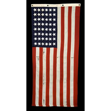 48 STAR, U.S. NAVY SMALL BOAT ENSIGN, MADE AT MARE ISLAND, CALIFORNIA DURING WWII, SIGNED AND DATED MARCH, 1941