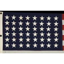 48 STAR, U.S. NAVY SMALL BOAT ENSIGN, MADE AT MARE ISLAND, CALIFORNIA DURING WWII, SIGNED AND DATED MARCH, 1941