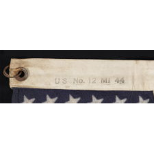 48 STAR, U.S. NAVY SMALL BOAT ENSIGN, MADE AT MARE ISLAND, CALIFORNIA DURING WWII, SIGNED AND DATED 1944, IN THE SMALLEST SCALE EMPLOYED AT THE TIME