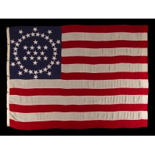 48 STARS ON AN ANTIQUE AMERICAN FLAG DESIGNED AND COMMISSIONED BY WAYNE WHIPPLE, AN EXTRAORDINARY DESIGN AND ONE OF JUST TWO KNOWN EXAMPLES WITH PIECED-AND-SEWN CONSTRUCTION, 1909-1912