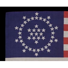 48 STARS ON AN ANTIQUE AMERICAN FLAG DESIGNED AND COMMISSIONED BY WAYNE WHIPPLE, 1911-1912, A RARE AND HIGHLY DESIRED, SILK EXAMPLE