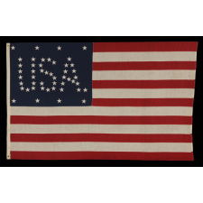 48 STARS CONFIGURED INTO THE LETTERS “U.S.A.”, COPYRIGHTED IN 1916 BY C.A. HARTMAN, ONE OF ONLY FOUR KNOWN SURVIVING EXAMPLES AND ONE OF THE MOST INTERESTING DESIGNS KNOWN TO EXIST IN EARLY FLAGS